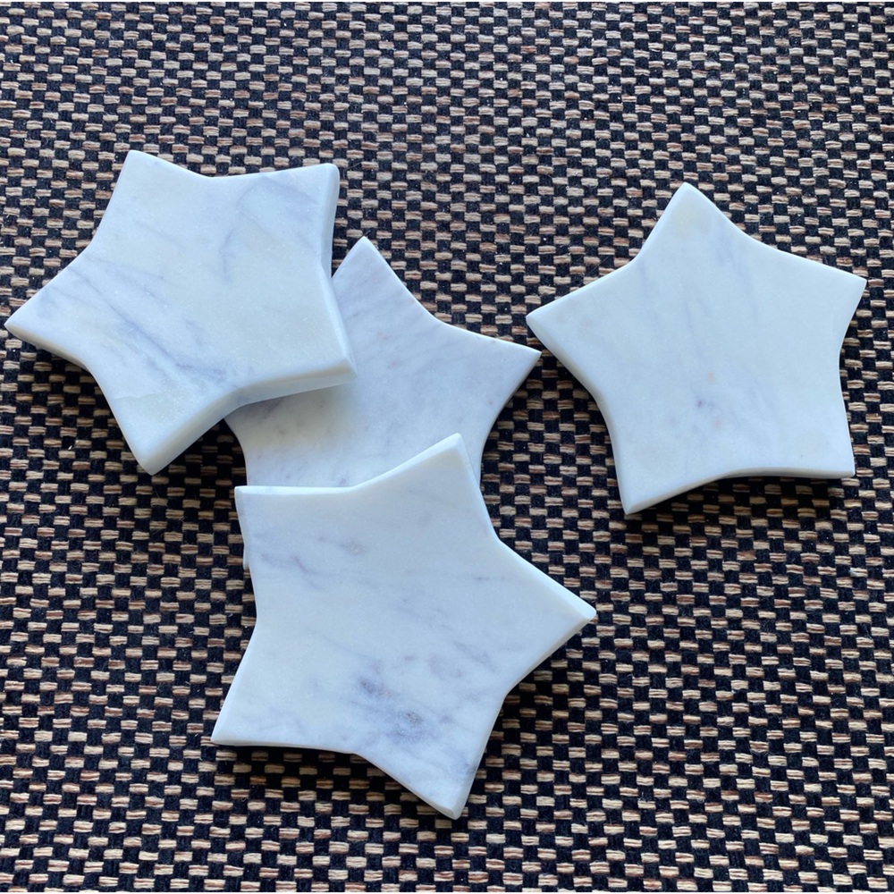 Arhaus white marble star shaped coasters (set of 4)